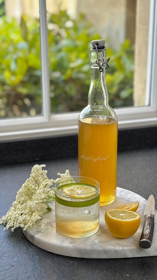 Making elderflower cordial at home last week 🤍It’s worth noting that the flowers should only be gathered on a warm, dry day – never wet, as the rainwater washes away the fragrant pollen which gives the syrup its distinctive flavour. I’ve shared our family recipe on my Substack for when the weather clears up. To me, it perfectly captures the essence of the English countryside during summer. Aromatic, floral and nostalgic.#elderflower #elderflowercordial #homemade #cotswolds #summer by @carolebamford