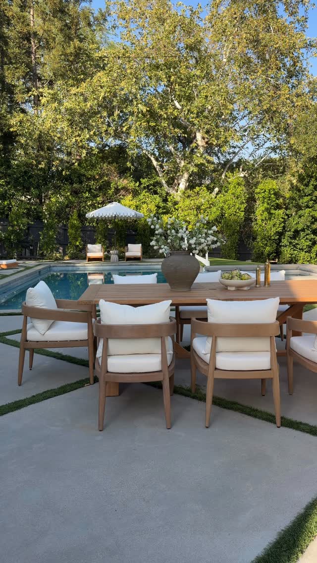 💫 Comment SHOP below to receive a DM with the link to this post on my LTK Love this dining set! The teak wood has such a pretty tone and I love the soft curves on the chairs! The chairs are made from tropical hardwood which naturally resists moisture, rot, and insect damage. Perfect addition to our backyard space! #ad #grandinroad #LTKHome #LTKSaleAlert⬇ https://liketk.it/6eEGe by @lisakanegae