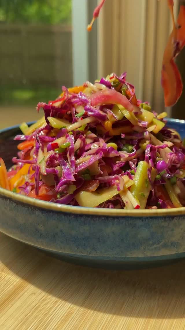 Rainbow salad!! This is phenomenal on its own, but is also fantastic with chicken thighs, salmon, shrimp etc. also amazing with avocado!! Recipe belowRainbow salad: -1 bell pepper, sliced thin-1 cucumber, sliced thin -4 radishes, cut into matchsticks -1 mango, sliced thin -4 scallions, chopped -1/4 head of purple cabbage, shredded or sliced thing -as much Cilantro as you want, finely chopped -1/4 cup pickled onion -Chopped peanuts for garnish (sub any nut)Peanut sauce:-2 tbsp peanut butter (sub any nut or seed butter)-1 tbsp maple syrup -3 tbsp coconut aminos -1 tbsp rice vinegar -1/2 lime, juiced-1 tsp sesame oil -1/2 tsp fish sauce -2 tsp sriracha -2 garlic cloves -2 tsp fresh ginger 1. Add all salad ingredients (except peanuts) to a large bowl. 2. Blend all dressing ingredients until smooth. Taste & adjust as needed. Dump dressing over the veggies and toss well. 3. Serve with crushed peanuts on top. Enjoy! #salad #rainbowsalad #eattherainbow #veggies #healthyrecipe by @zmargotz