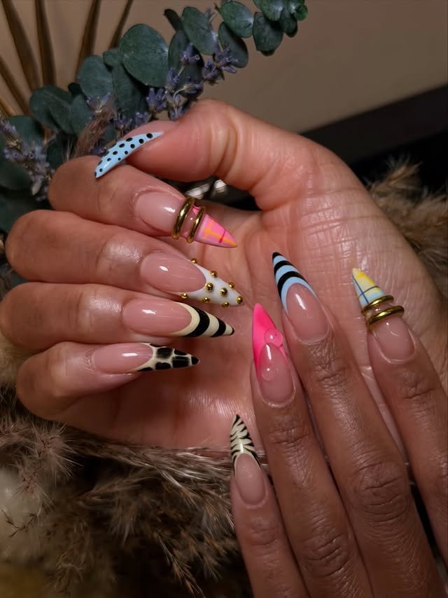 Mix it up freestyle 🌝🦓🩵🌸Cutesy mix of abstract nail designs and gold details—this set is definitely cool girl coded !Artist: @the.front.page Where nail lovers link up 💅🏾 #thenailconnection #springnails #lovenails #nailinspo #nailsnailsnails by @thenailconnection