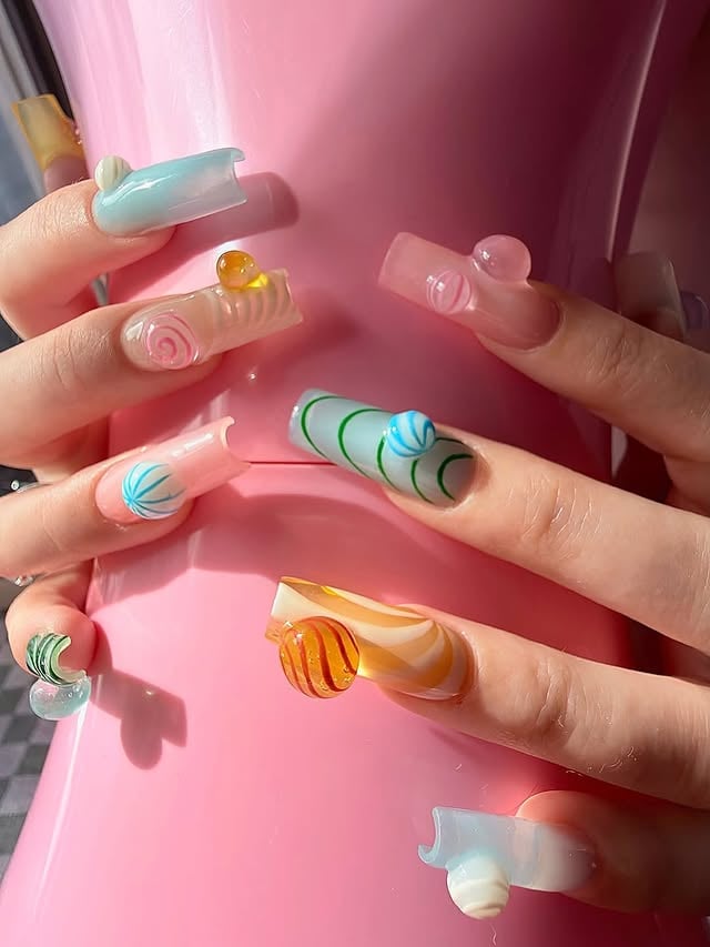 Glassware Swirls 🍡🫧🧼🪐Pastel swirled nails inspired by blown glassware—this set is so good we’re way too obsessed !Artist: @badgirlsgoodnails Where nail lovers link up 💅🏾 #thenailconnection #3dnailart #swirlnails #nailinspo #nailsnailsnails by @thenailconnection