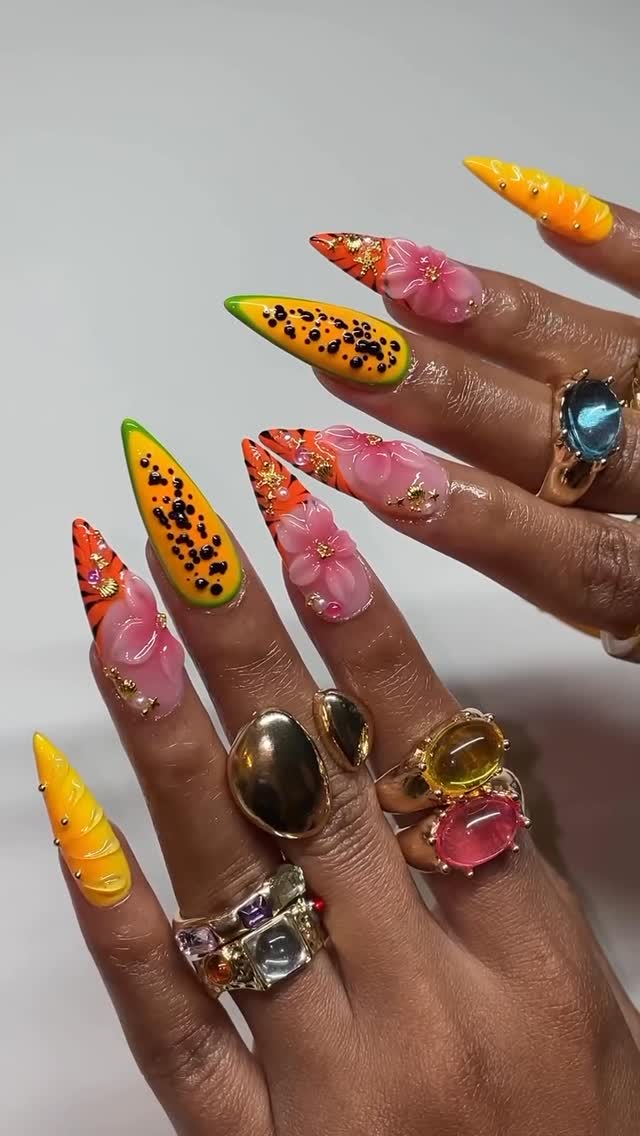 Tropical Paradise 🌸🥭🐅🌺Papayas, mangoes, animal prints, and florals—this set is getting us ready for vacation !Artist: @pastelnails Where nail lovers link up 💅🏾 #thenailconnection #vacationnails #tropicalnails #nailinspo #nailsnailsnails by @thenailconnection